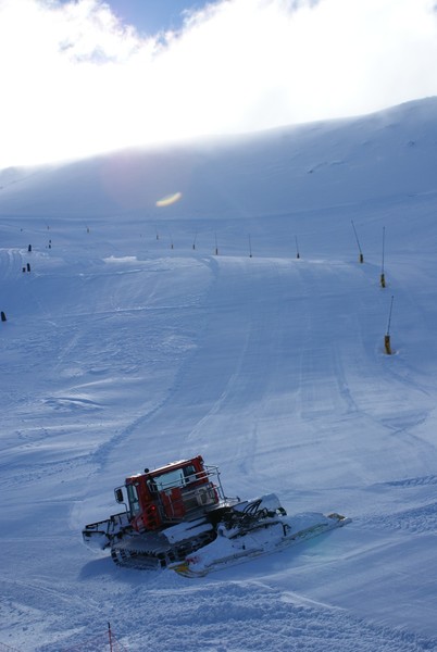 Snow groomers preparing for tomorrow's opening.